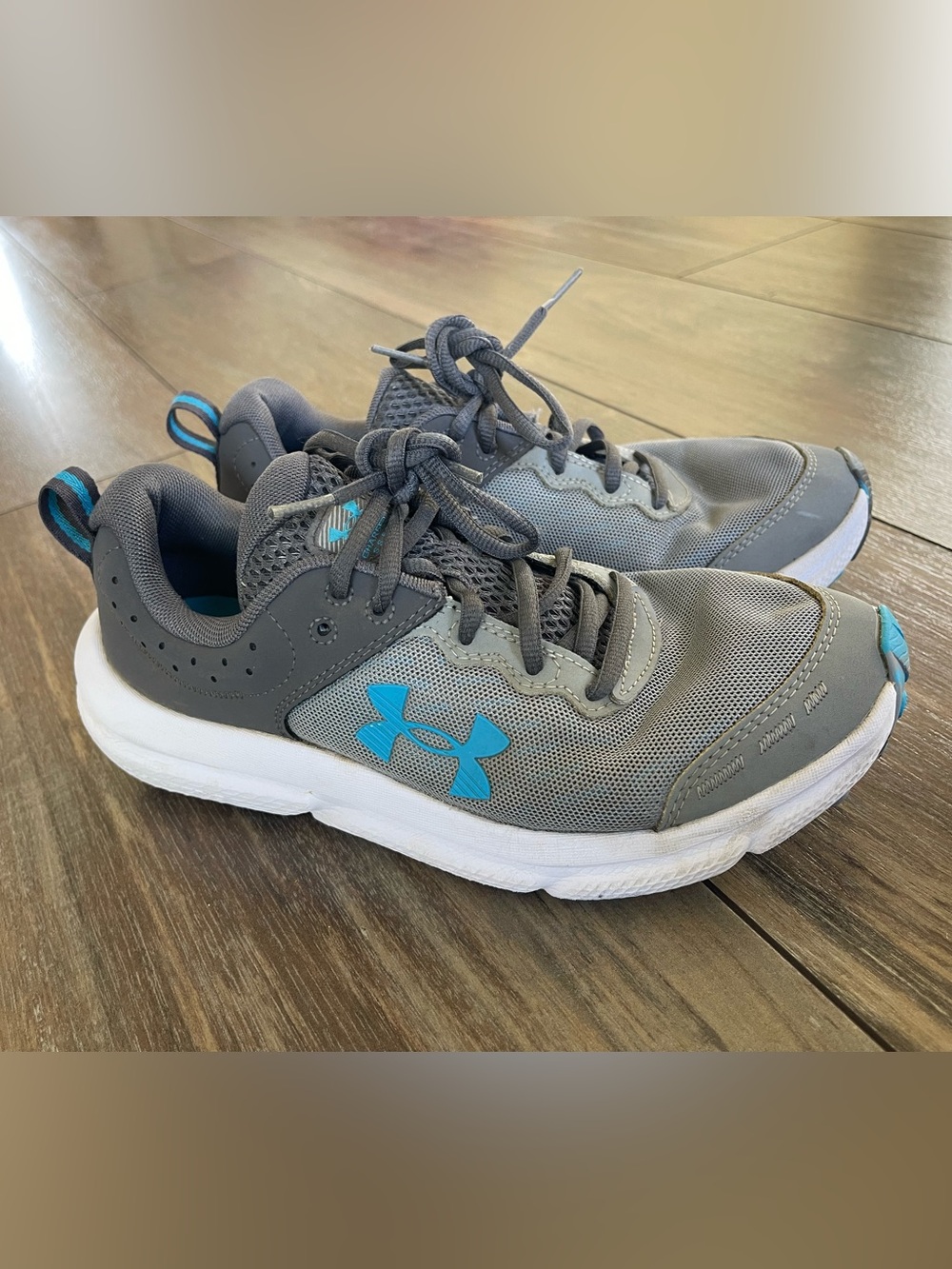 Under Armour Charged Assert 10 AC GS grey and blue size US 7Y (Eur 40) Men’s US7